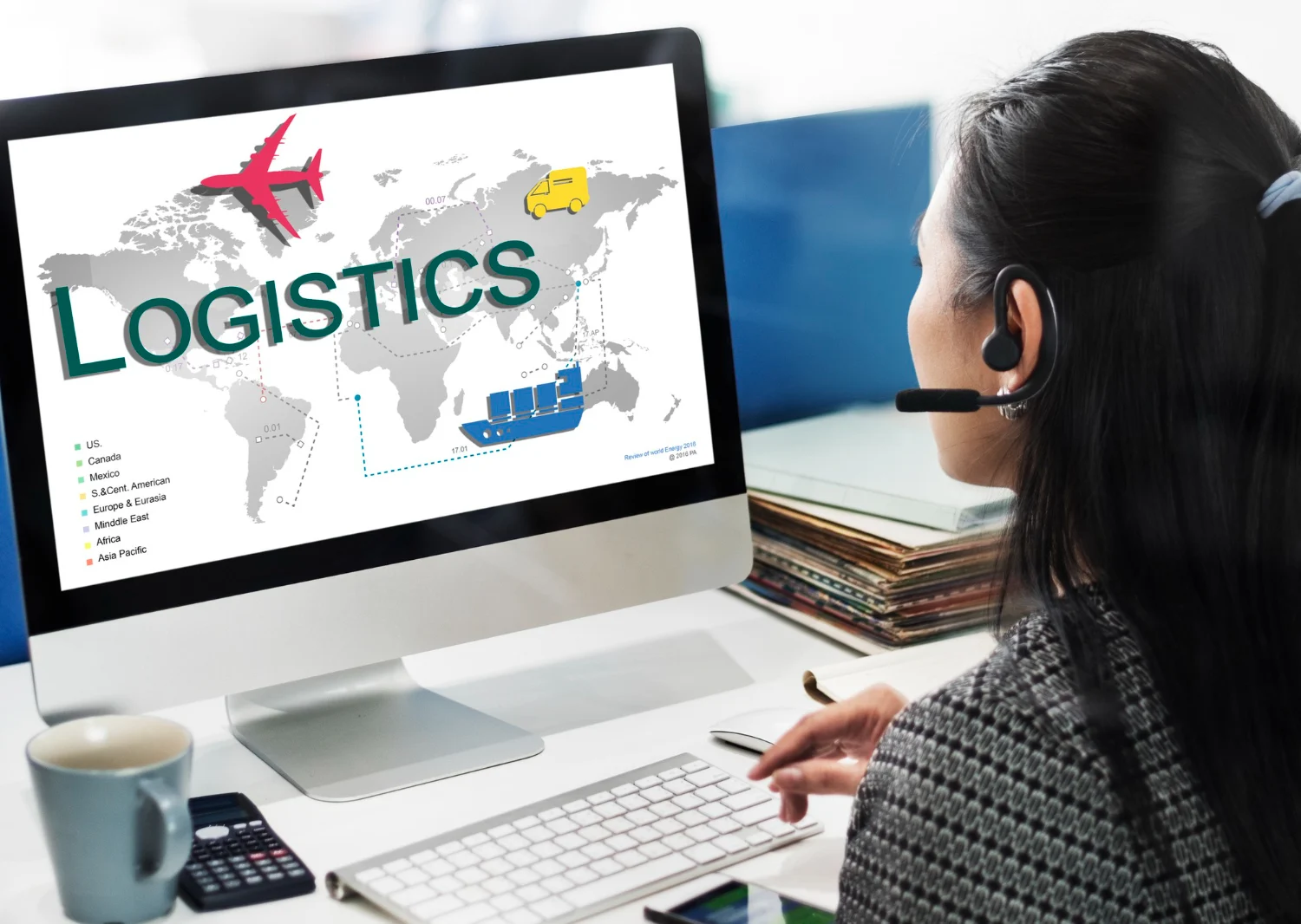Person using computer to manage logistic