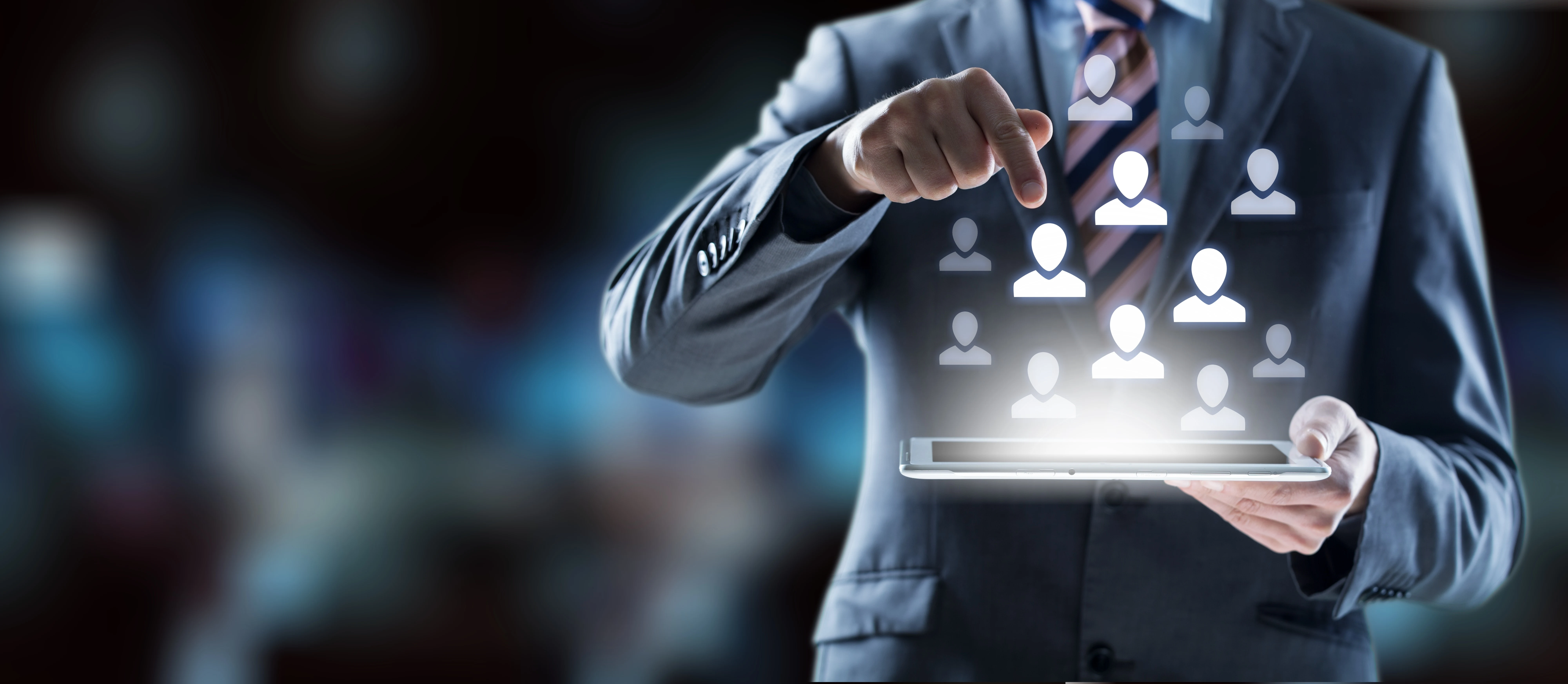 Close up view of man using tablet